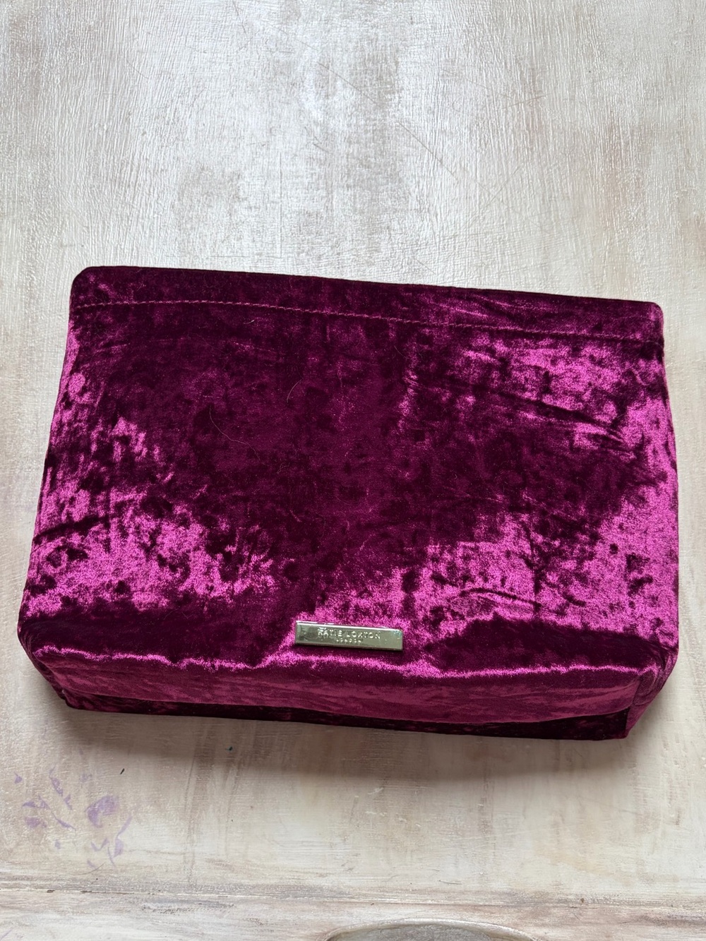 Katie Loxton magenta crushed velvet pouch bag